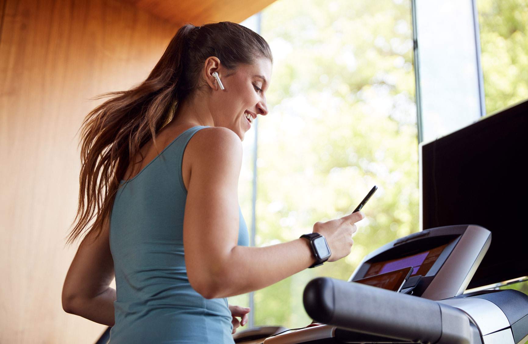 Irene working out with wearable fitness tech